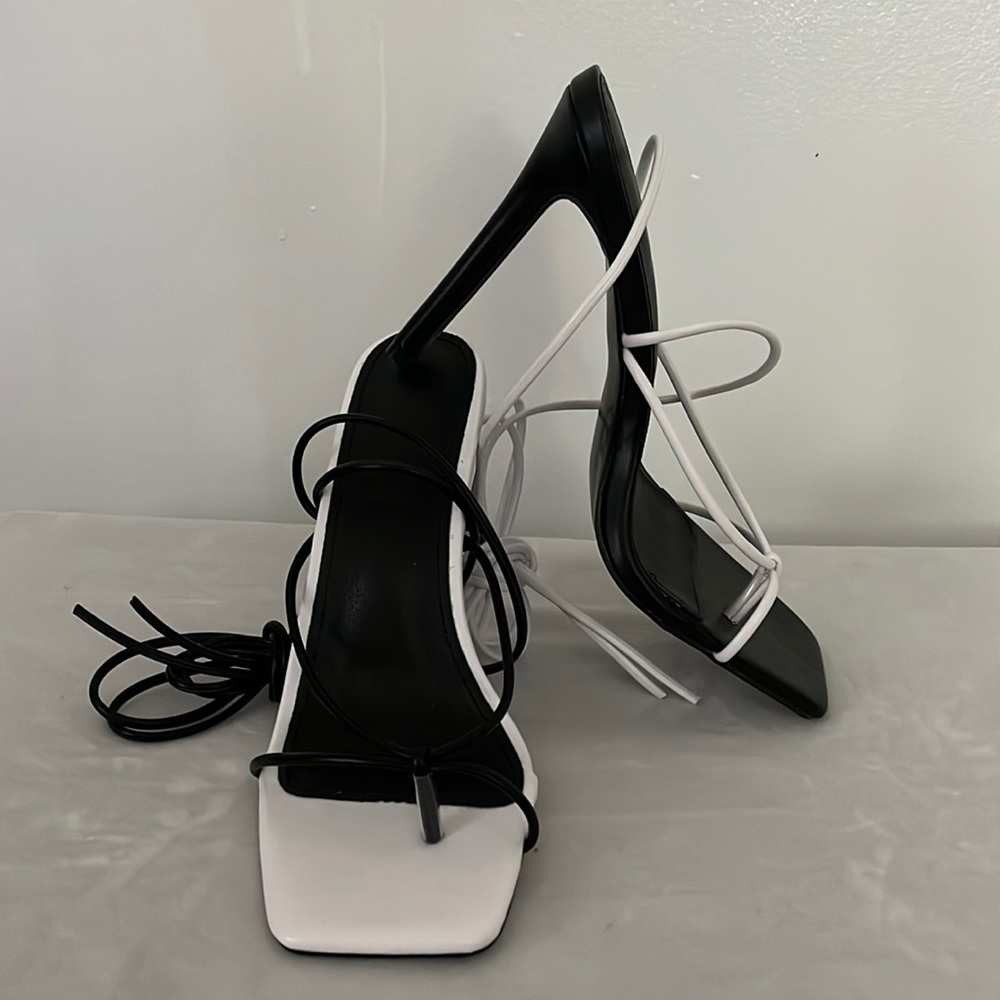 Black and white stripy ankle wrap, thong sandal.